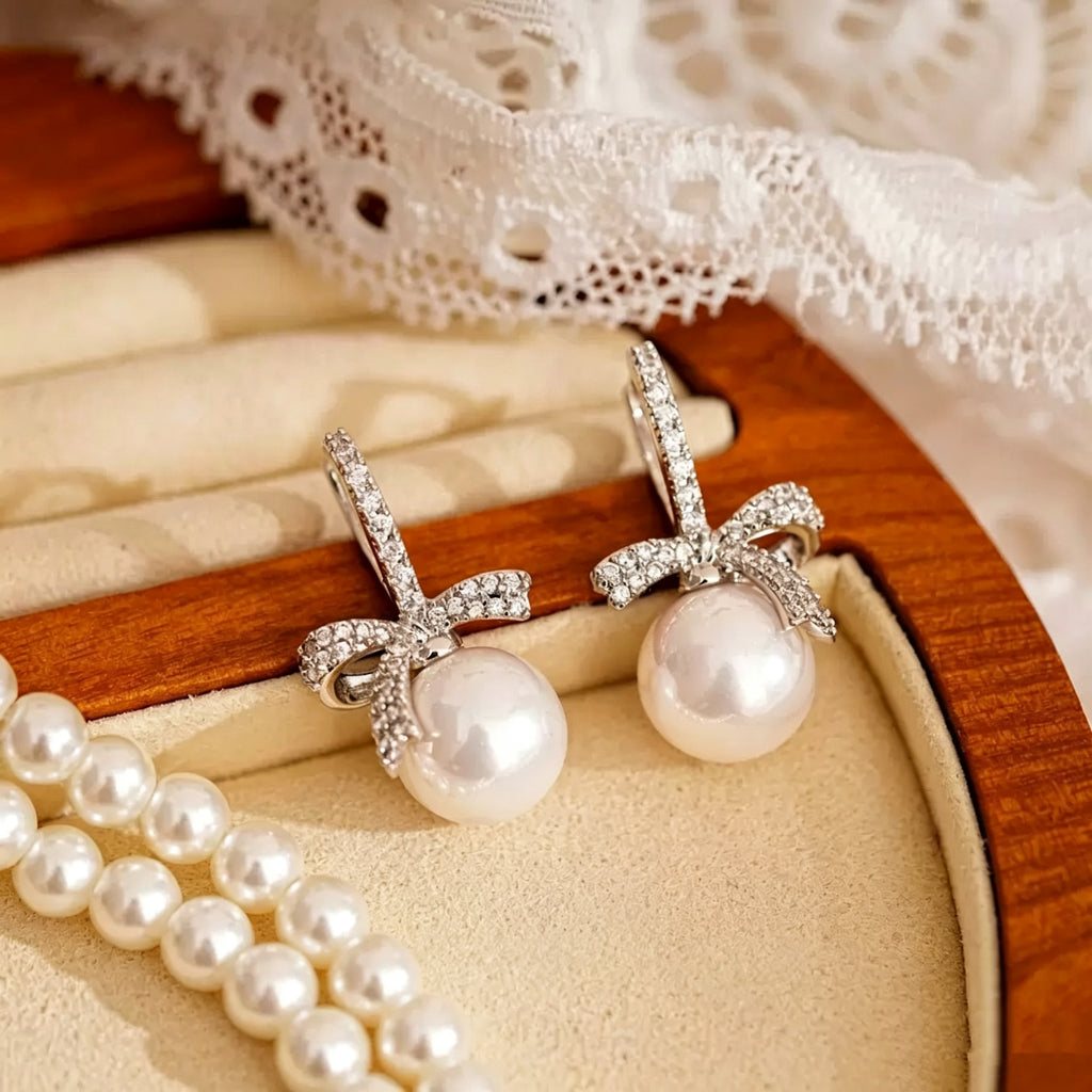 Bow-Shaped Pearl Pendant Earrings