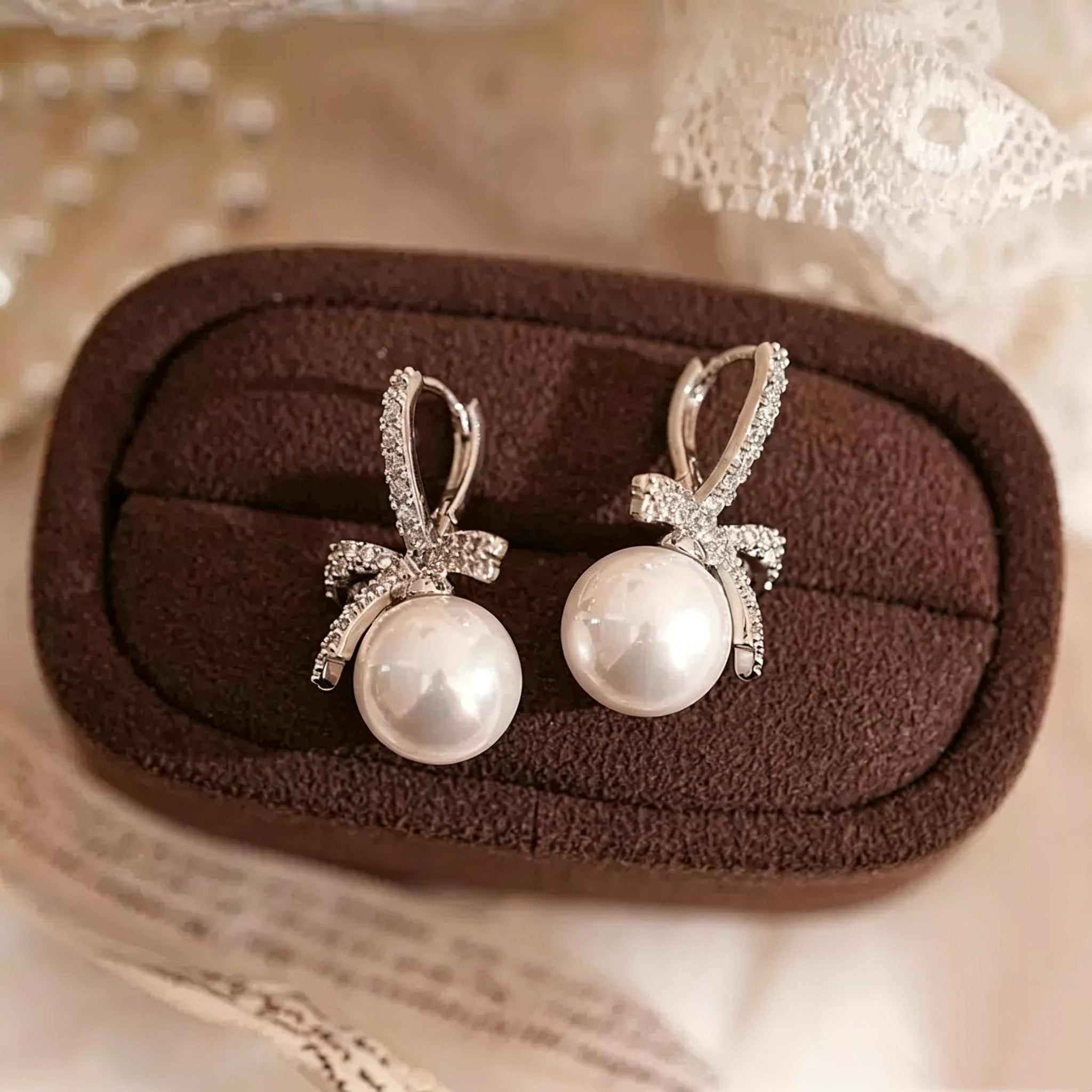 Bow-Shaped Pearl Pendant Earrings